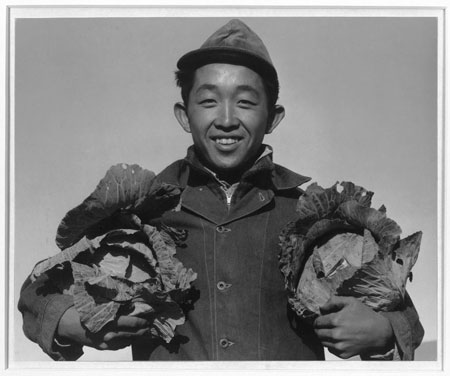 Smiling japanese internees - photo by Ansel Adams
